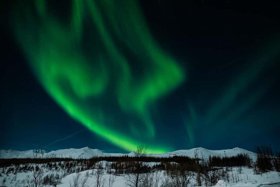 Akureyri: Northern Lights Tour - The aurora explanation: particle collisions and the polar cap effect