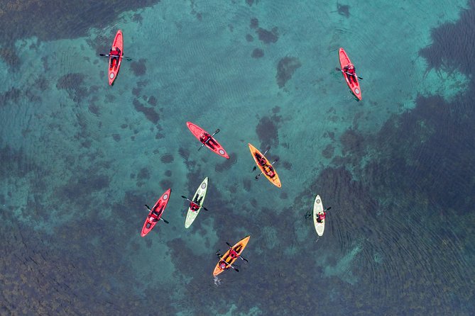 Classic Kayaking Adventure by Mt. Kirkjufell - Gear up fast: dry suits, warm-up help, and first-timer confidence