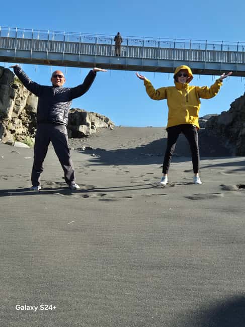 From Airport to Adventure: Private Reykjanes Peninsula Tour - Reykjanes Lighthouse and Baejarfell Hill: wind, scale, and coastal air