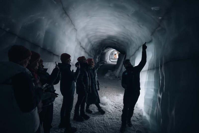 From Húsafell: Into the Glacier Ice Cave Adventure - Inside the ice tunnel: glowing blue ice and the glacier timeline