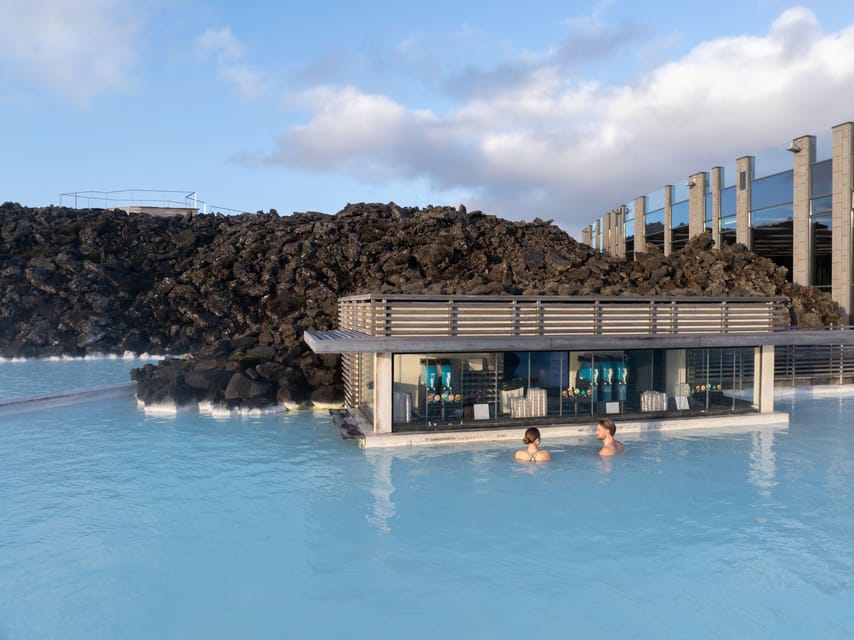 From Reykjavík: Blue Lagoon Premium Admission with Transfer - Premium Admission Perks: Bathrobe, Drink, and In-Water Masks