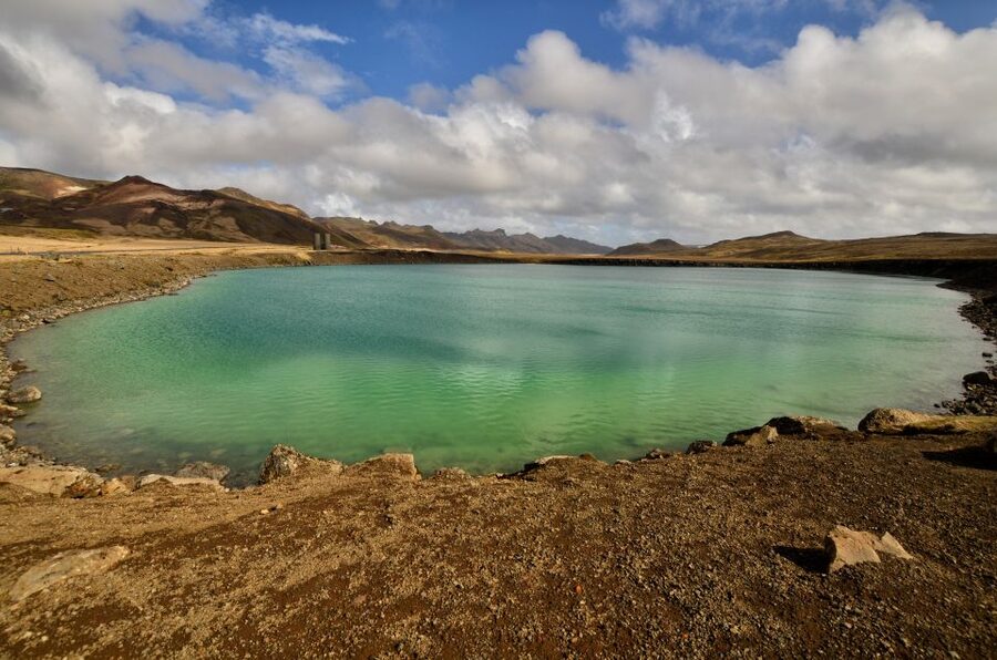 From Reykjavik: Reykjanes Geopark Tour & Airport Transfer - Gunnuhver mud pools: steaming sulfur pits and the local ghost story