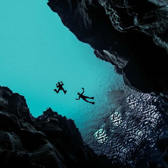 From Reykjavík: Silfra Snorkeling with free photos - Gear up and get briefed, then swim with real coaching