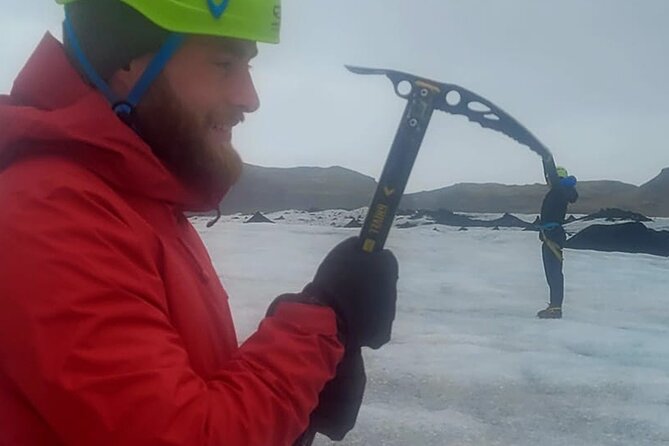 Glacier Hike Experience on Sólheimajökull - Meet on location - Getting kitted up fast: crampons, helmet, and the ice pick