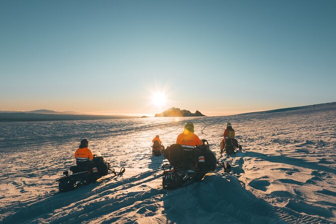 Glacier Snowmobiling and Natural Ice Cave Tour from Reykjavik - Group size, comfort, and what sharing a snowmobile means