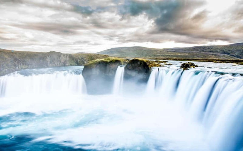 Godafoss Waterfall & Turf House Tour from Akureyri Port - Coach comfort and group experience, with Wi-Fi support