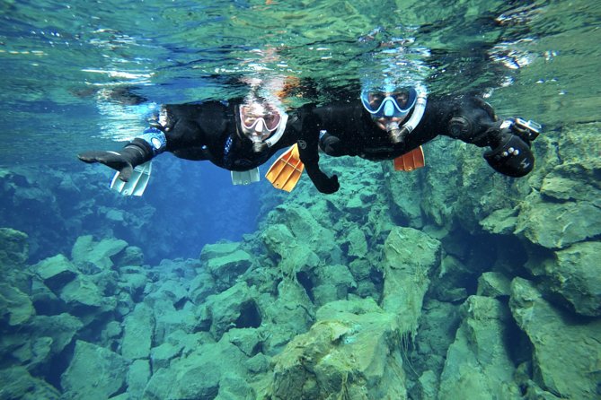 Golden Circle & Snorkeling in Silfra From Reykjavík with Free Photos - Þingvellir, Gullfoss, and Haukadalur: The Golden Circle in Real Time