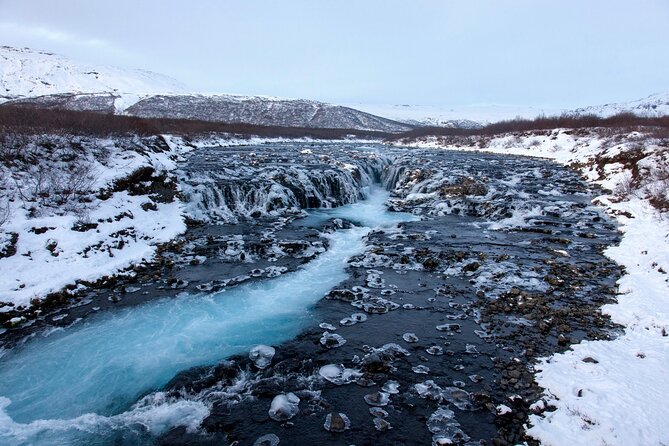 Golden Circle Tour from Reykjavík Þingvellir Geysir & Gullfoss - Brúarfoss Waterfall: a calm photo break with that bright blue look