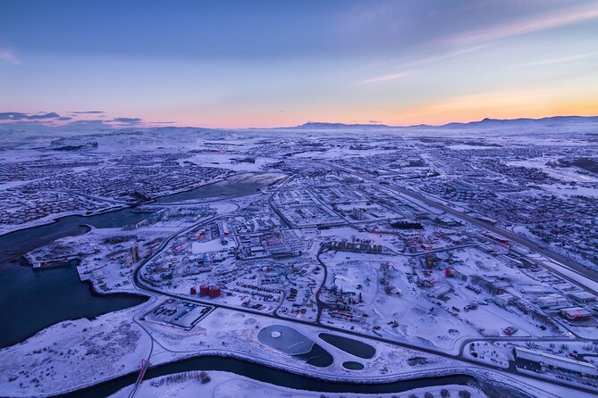 Helicopter Tour with Mountain Summit Landing from Reykjavik - Flyovers of Harpa, Perlan, and Hallgrímskirkja