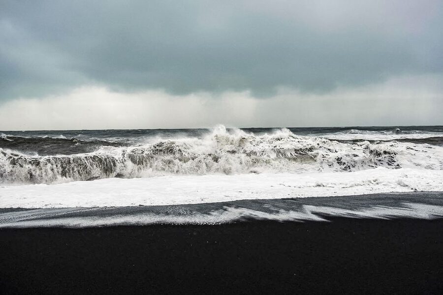 Iceland: Full-Day South Coast, Black Beach & Waterfalls Tour - Reynisfjara black sand beach: basalt columns and a safety-first walk