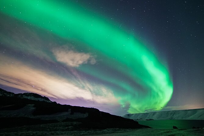 Northern Lights Minibus Tour with Hot Cocoa, Blankets & Photos - Stop Two: The Moment the Aurora Shows Up (and the Tour Gets Cozy)