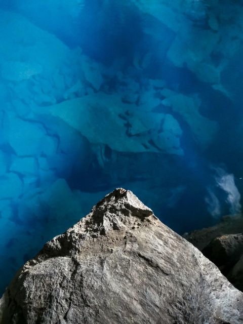 Port Akureyri: Godafoss Waterfall, Myvatn and Baths Tour - Grjótagjá cave: the hot blue river stop