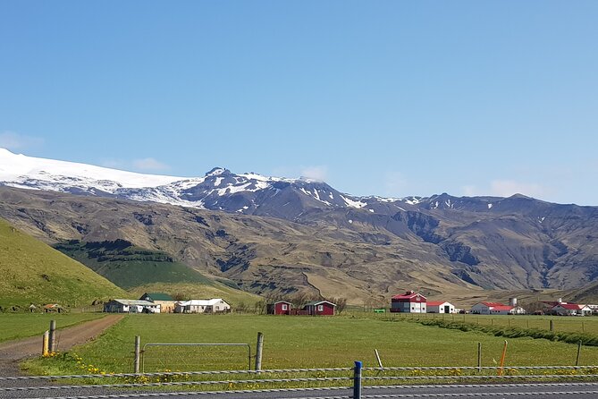 Private Day Tour: Explore Iceland’s South Coast & Glacier Hike - Skógafoss to Dyrhólaey: cliffs, scale, and the south coast view line