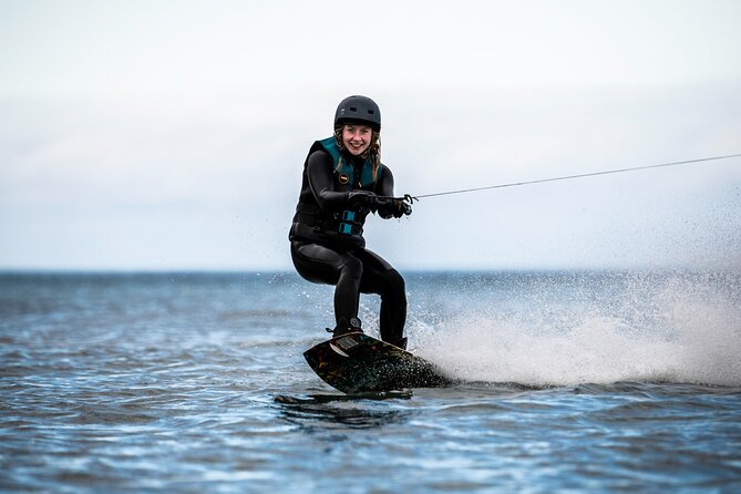 Private wakeboarding or waterskiing trip in Westfjords - The Flateyri beach session: learning fast on white sand
