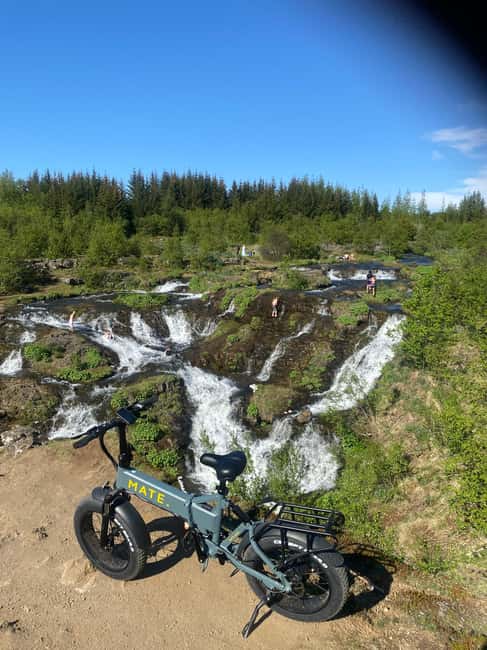 Reykjavik: Nature Loop Bike Tour from Nauthólsvík Beach - Elliðaárdalur, riding the river through waterfalls and lava rock