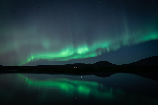 Reykjavik Northern Lights Tour with Professional Photographer - Weather cancellations and what to expect if the sky does not cooperate