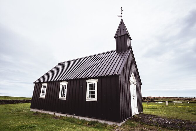 Reykjavík: Snæfellsnes & Kirkjufell Small Group Tour - Stop 4: Búðakirkja church, minimal shape against rough Iceland