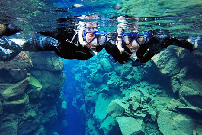 Silfra Drysuit Snorkeling Tour with Free Photos - From Reykjavik - In The Water At Silfra: Visibility, Breathing, And That Floating Feeling