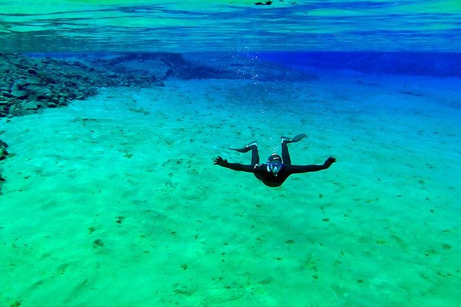 Silfra Wetsuit Snorkeling - Meet on Location | Free Photos - Price and Value for a 3-Hour Guided Micro-Adventure