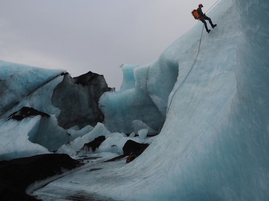Sólheimajökull Ice Climb and Glacier Hike - Gear handoff: boots, crampons, helmet, harness, axe, ropes