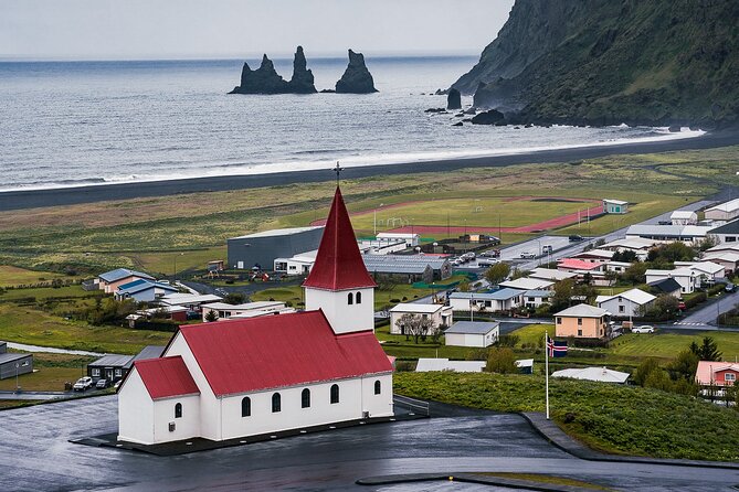 South Coast and Glacier Walk Full day Private Tour From Reykjavík - Stop 1: Skógafoss waterfall, 40 minutes of pure roar