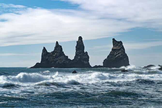 South Coast and Glacier Walk Full day Private Tour From Reykjavík - Stop 2: Reynisfjara black sand beach and the Reynisdrangar sea stacks