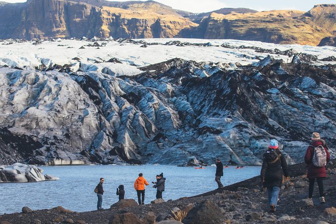 South Coast Day Tour Black Sand Beach & Waterfalls from Reykjavik - Stop 2 Skogafoss: stairs to the top and possible Eyjafjallajokull views