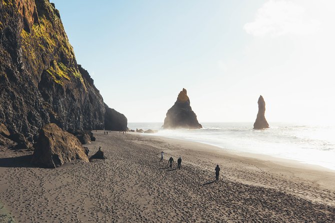 South Coast Day Tour Black Sand Beach & Waterfalls from Reykjavik - Stop 4 Solheimajokull Glacier: walking to the edge and touching ice