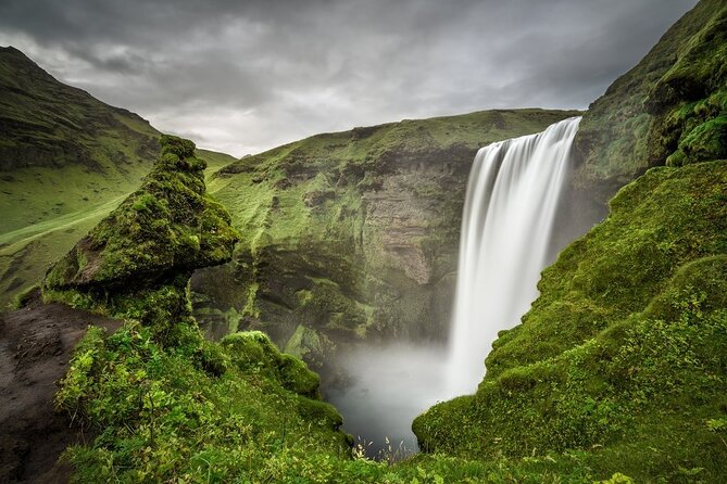 South Coast of Iceland and Glacier Walk PRIVATE TOUR - Skógafoss: The 60-Meter Drop and Rainbows in the Mist