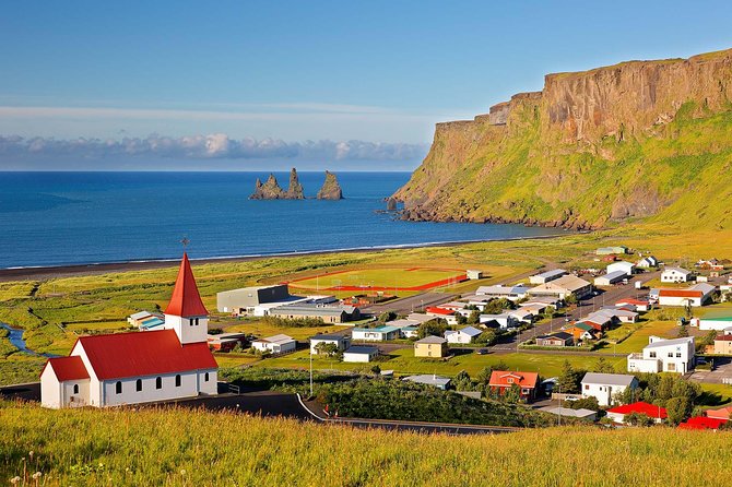 South Coast Summer Day Tour by Minibus from Reykjavik - Skógafoss: massive water, constant mist, and rainbow chances
