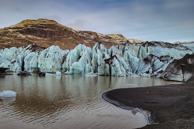 South Coast Tour: Glaciers, Waterfalls & Black Sand Small Group - Seljalandsfoss: walking behind a 60 meter waterfall