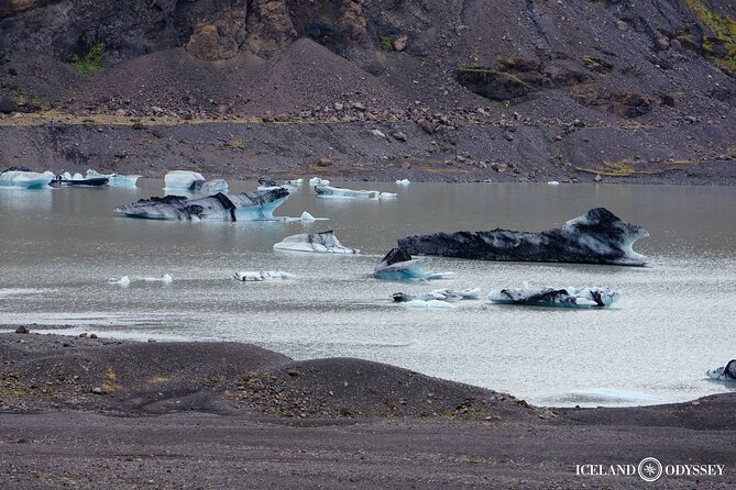 South Coast Tour: Glaciers, Waterfalls & Black Sand Small Group - Skogafoss: 60 meter drop with a Viking-style legend