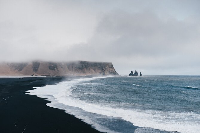 South Coast, Waterfalls and Black Sand Beach (Small Group Tour) - Skogafoss: a 60 m waterfall, GoT vibes, and a fun local myth