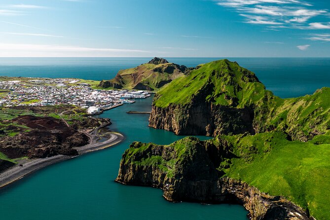 The Best of Vestmannaeyjar with Ebbi - Skansinn: the stave church area, Landlyst museum, and a cannon