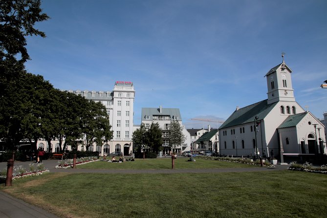Walking tour of Reykjavik city - Austurvollur Square: Parliament area details and curbside stories